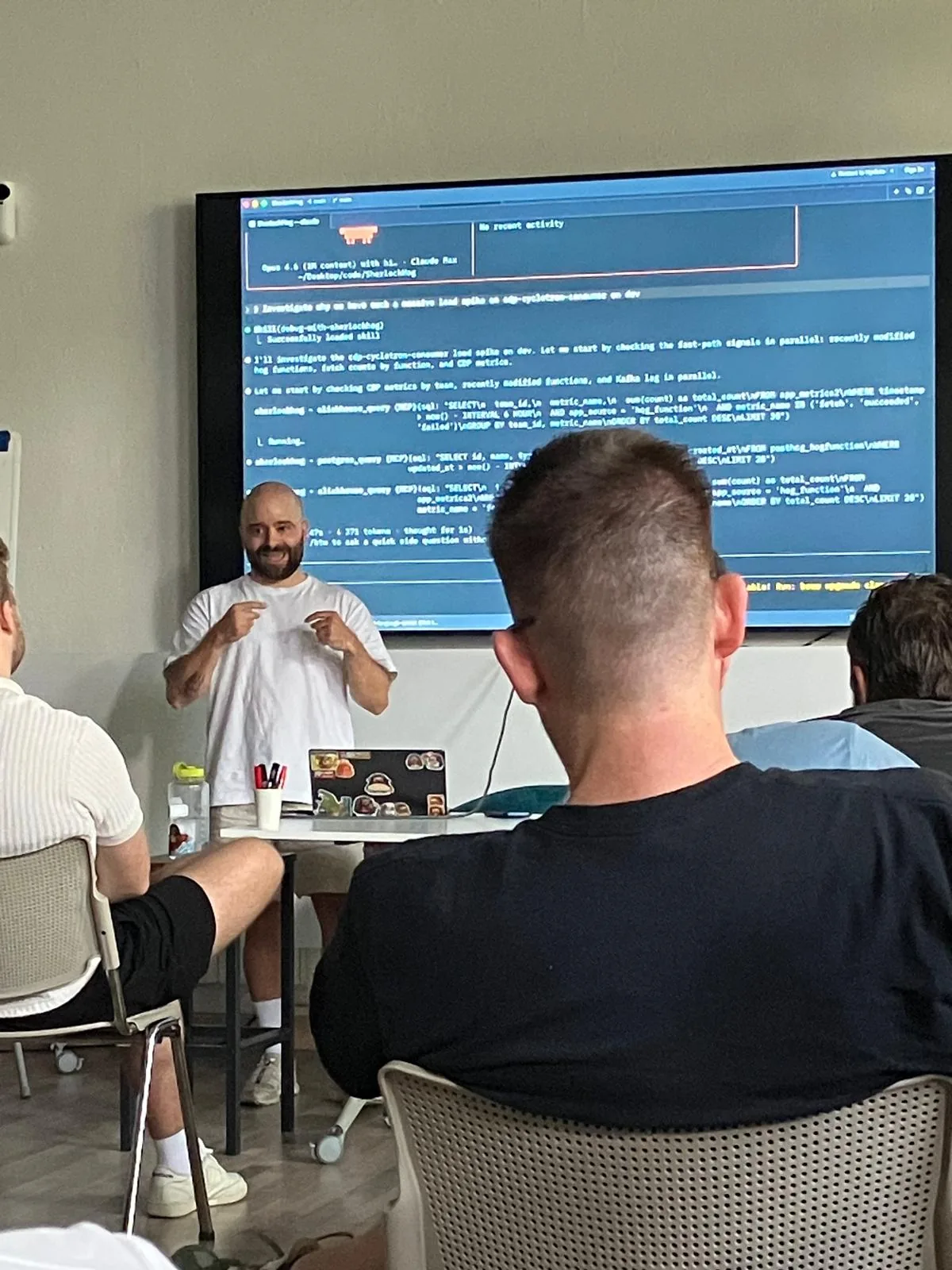 Meikel Ratz presenting a live coding example to the audience